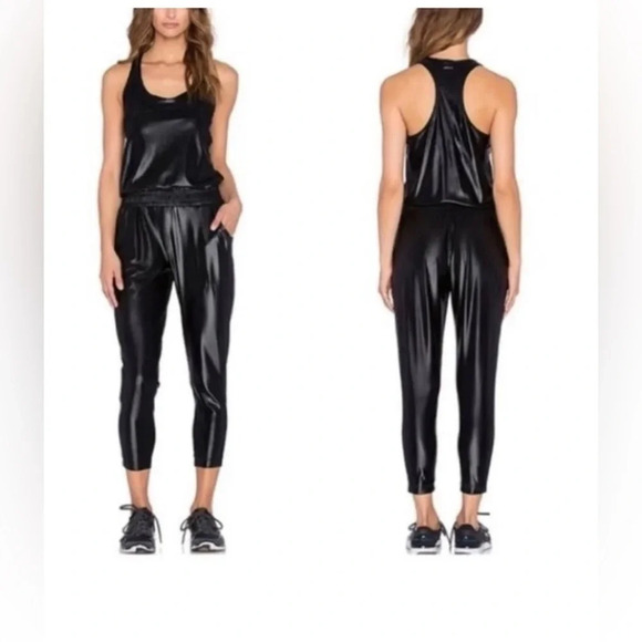 ! Koral Revolve Paradigm One Piece Jumpsuit in Black - Picture 1 of 5